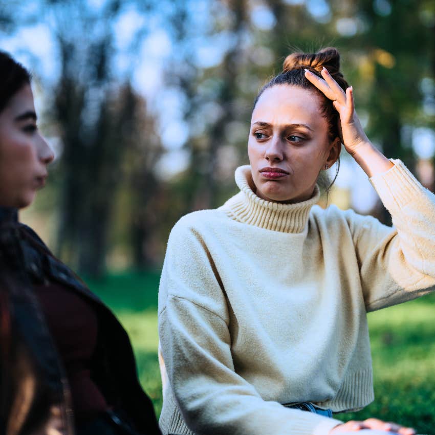 woman invalidating her own feelings out loud to a friend