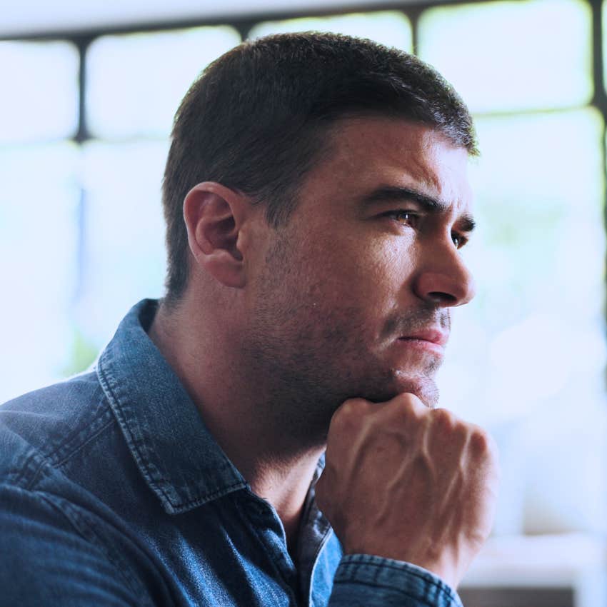 pensive man trying to control everything around him