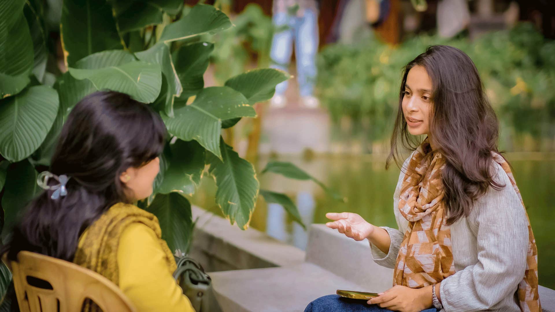woman raised by narcissistic parents telling her friend not to worry about her