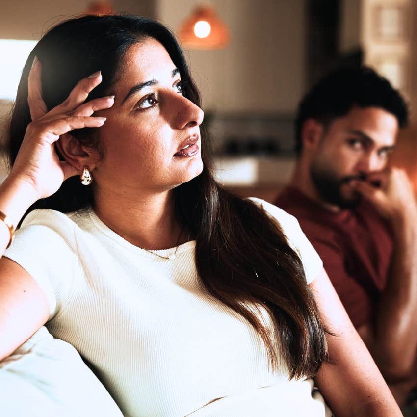 avoidant woman ignoring partner thanks to her workaholic parents