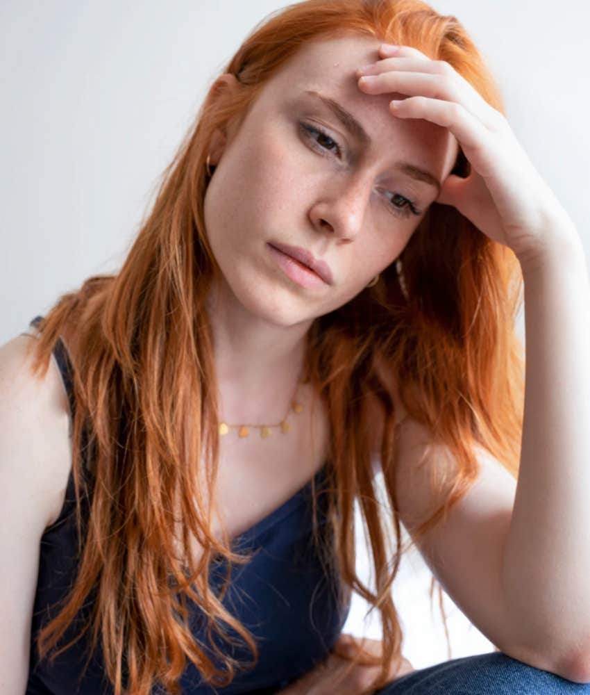 woman who is quietly avoiding an uncomfortable conversation 