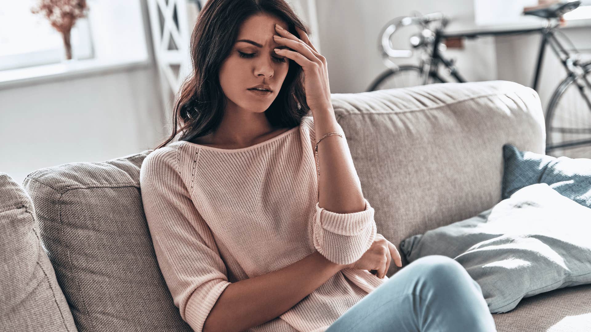 woman who had to manage her mom's bad moods struggling with guilt