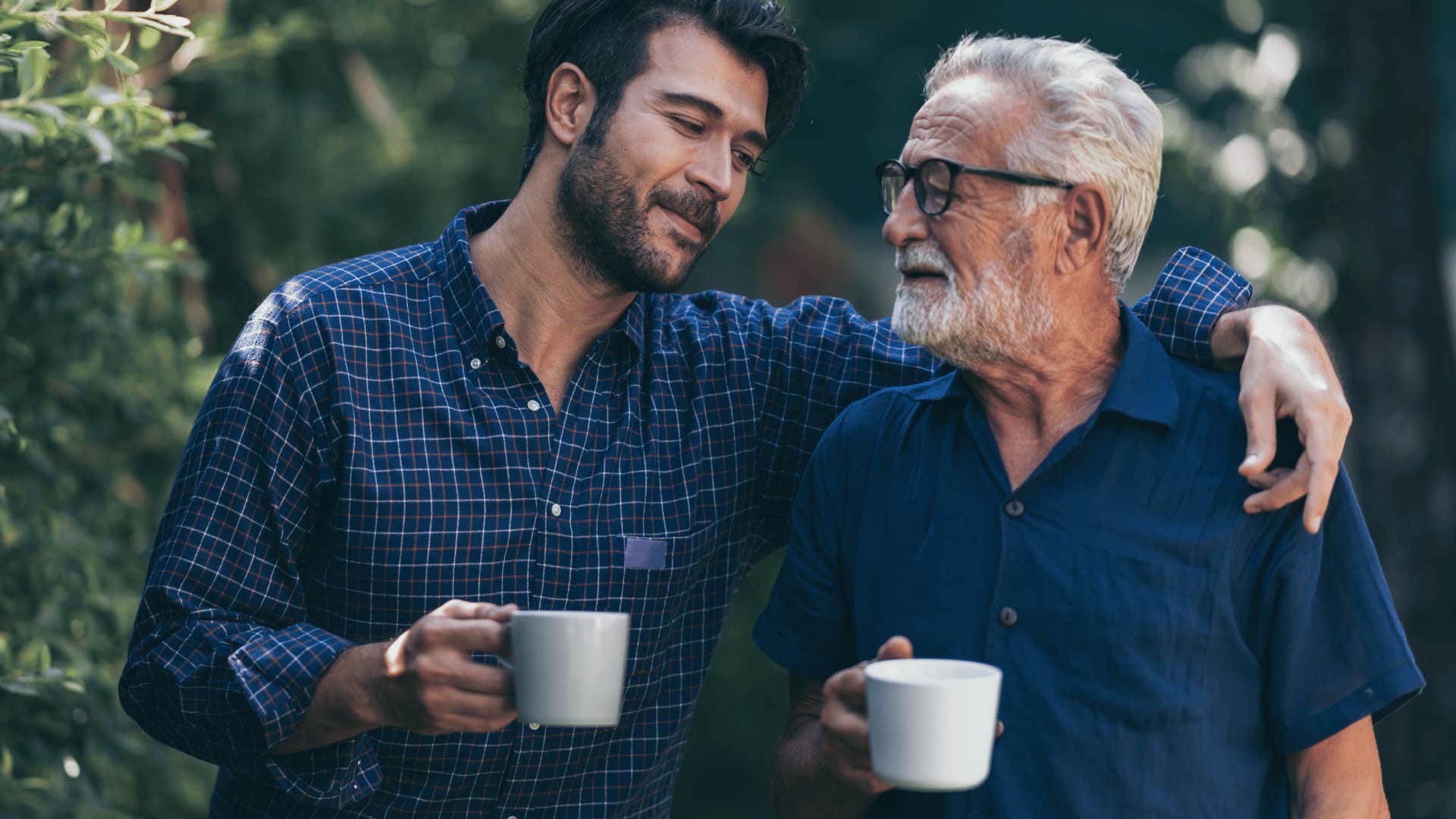 conscientious father walking with his son