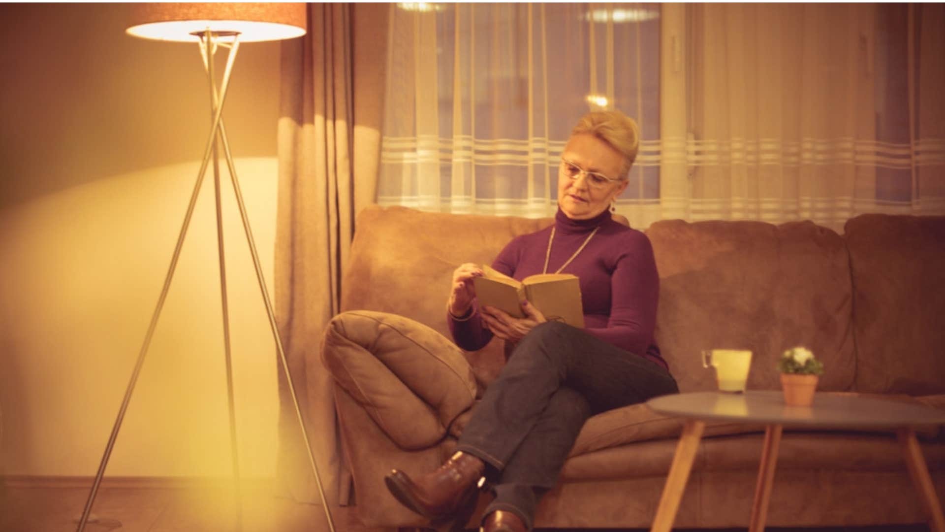 boomer woman reading happy to be in bed by 10 knows it's okay to miss out