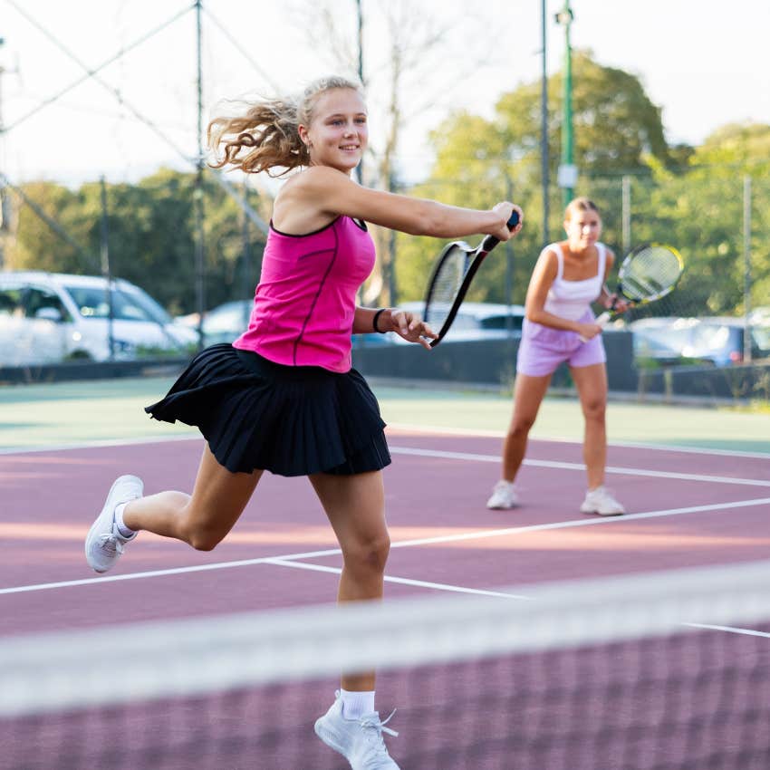 girl learning to manage pressure while playing tennis