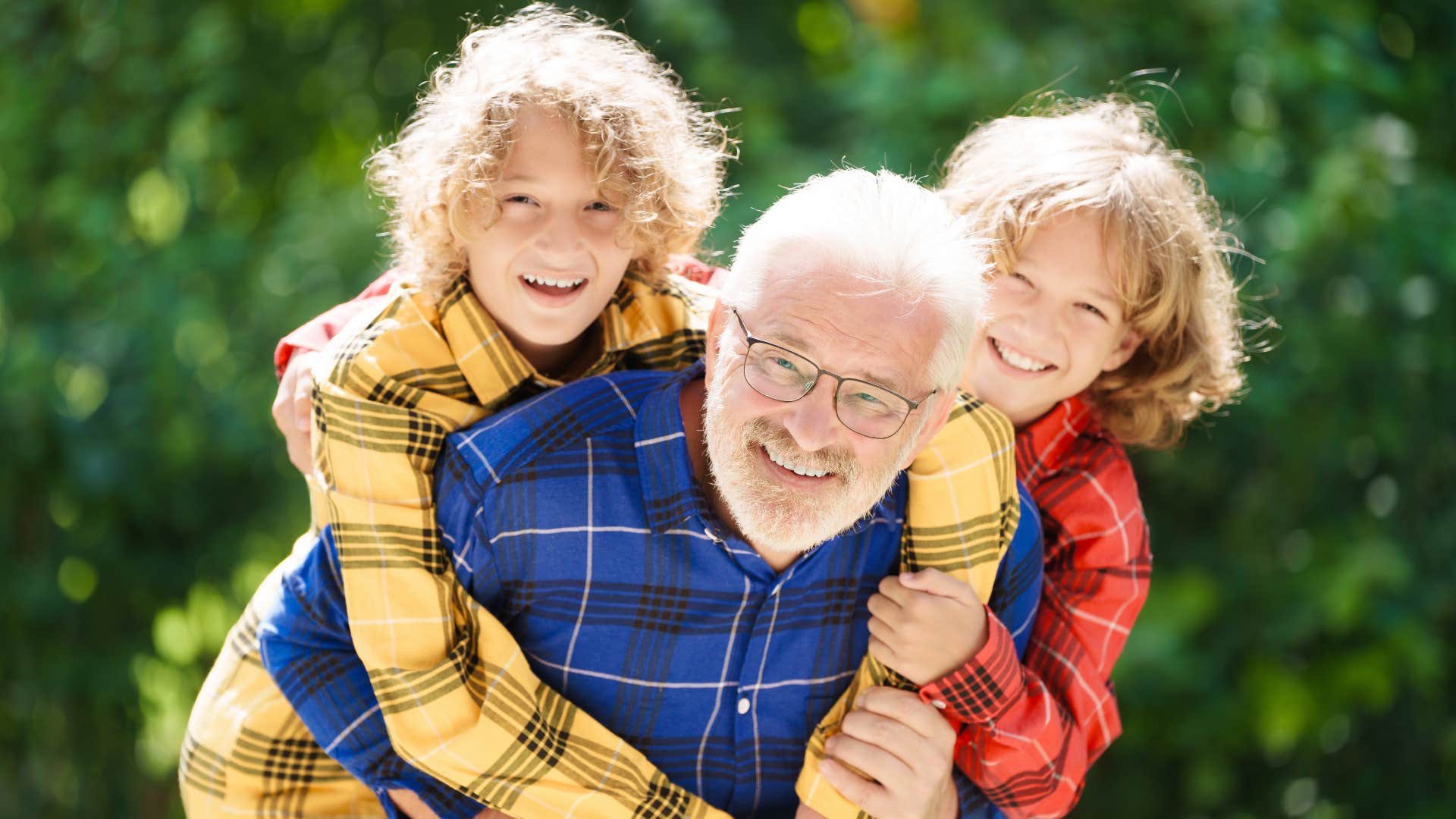 grandpa laughing and having fun with grandsons