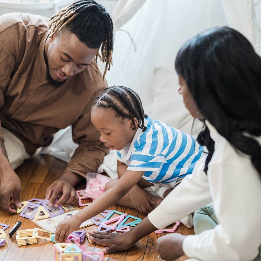 good parents spending quality time with child playing