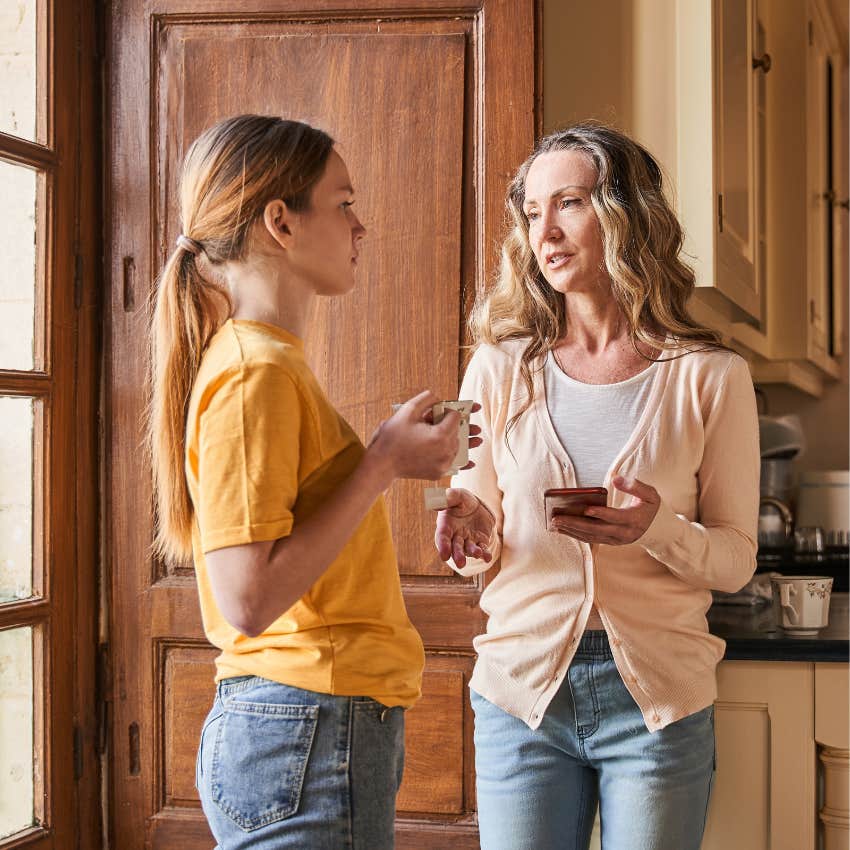 thoughtful mom talking to teen daughter taking her concerns seriously