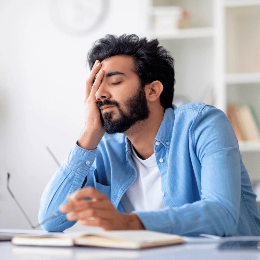 frustrated man fearing he's wasted too much time in bad relationship