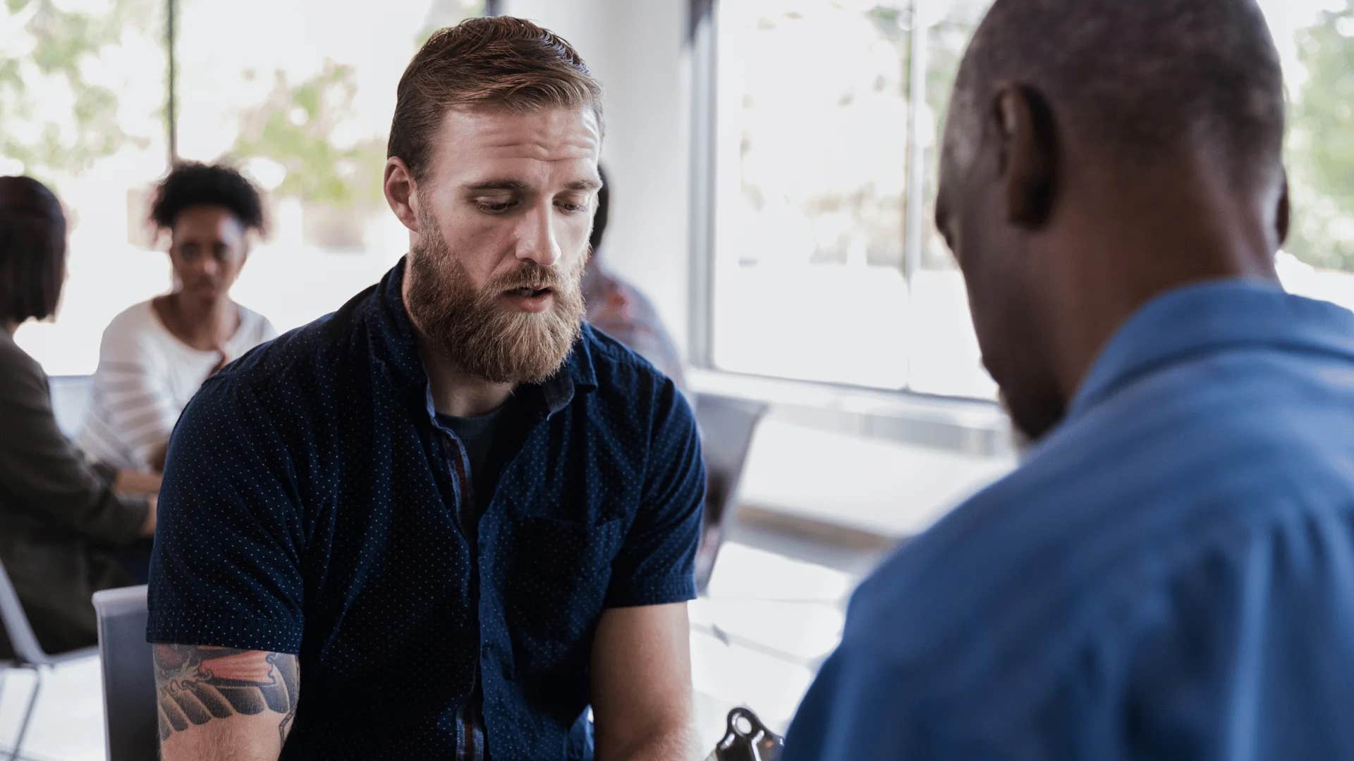 man admitting to friend i'm working on it