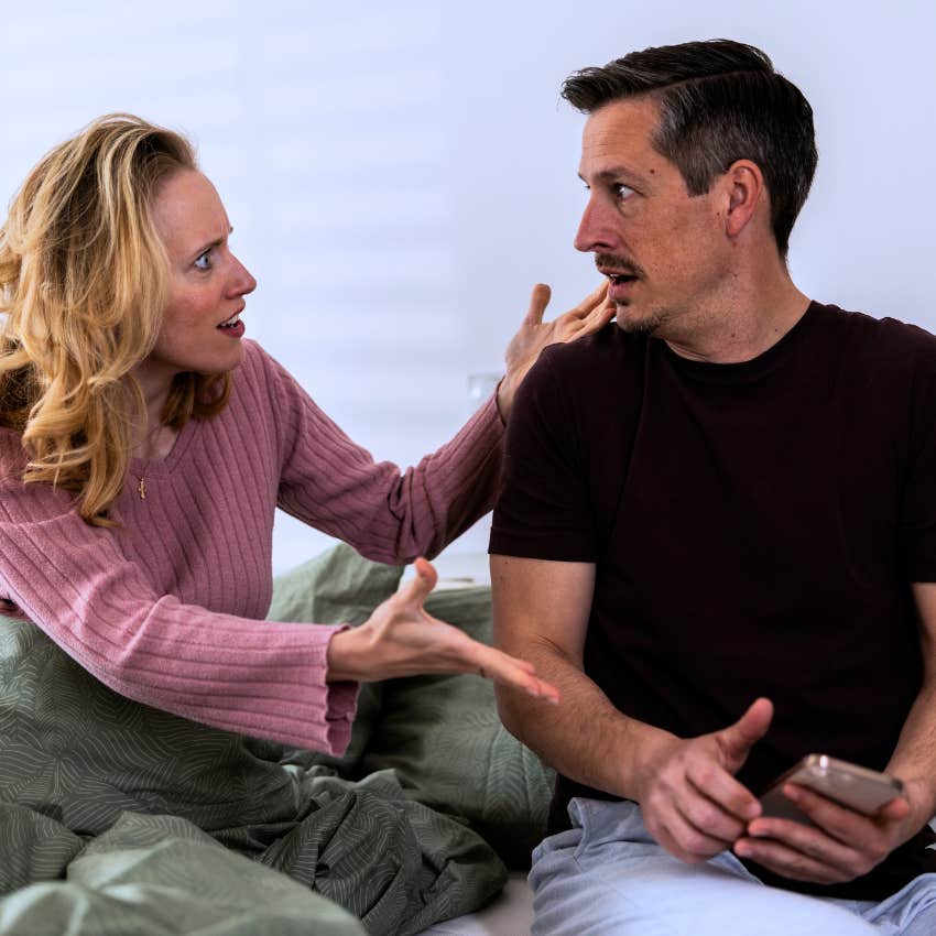 couple having an argument cheating man saying they're just a friend