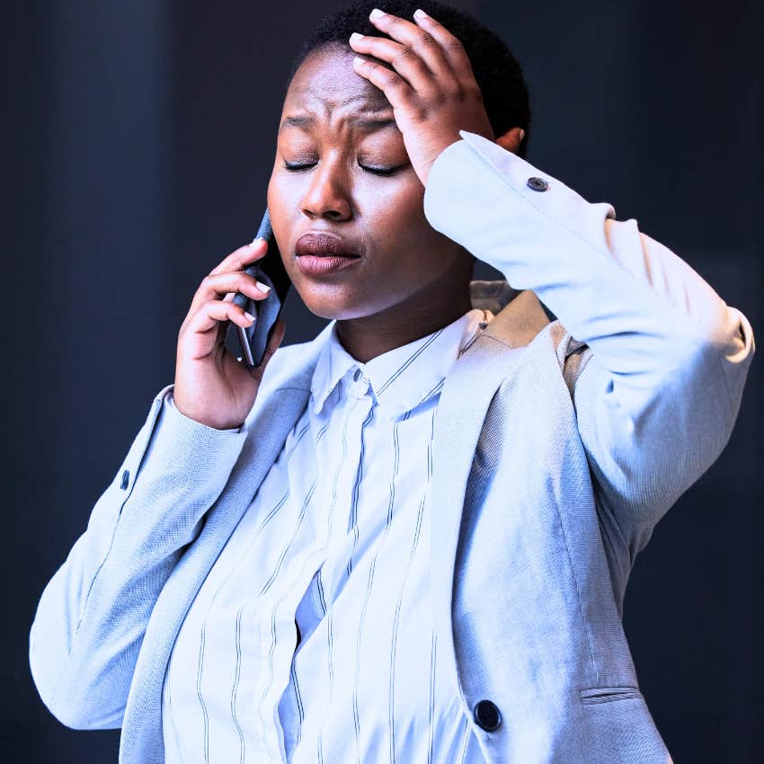 stressed overstimulated woman on the phone saying it's been a long day