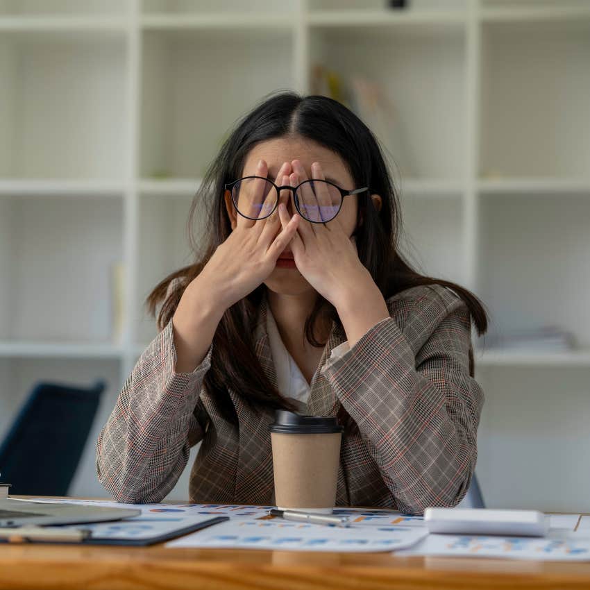 woman thinking she needs to get out of a job she hates