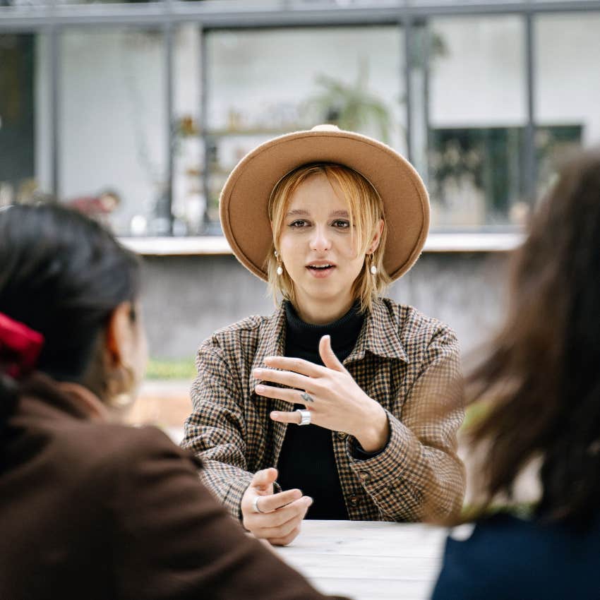 woman wanting compliments telling friends a farfetched story