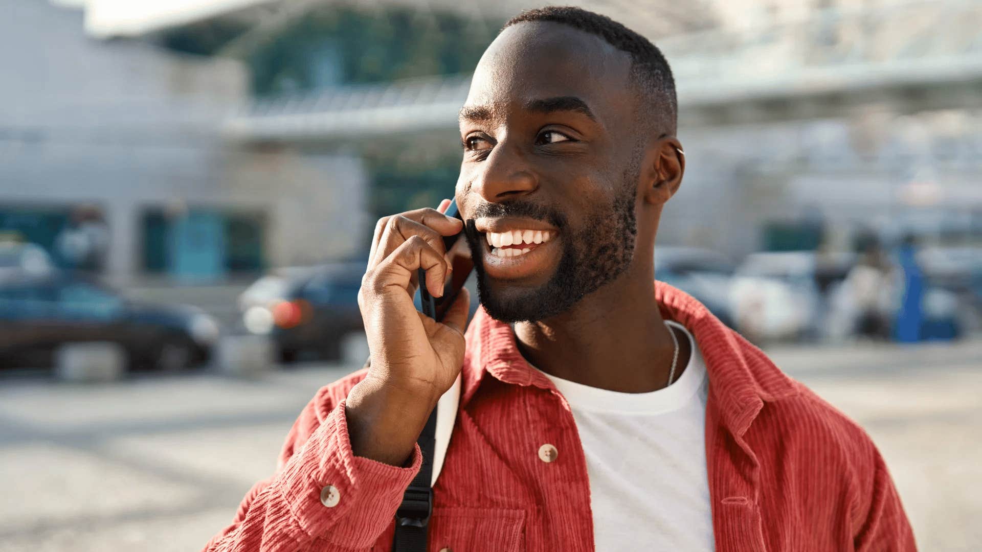 man talking on the phone about not communicating outside of work