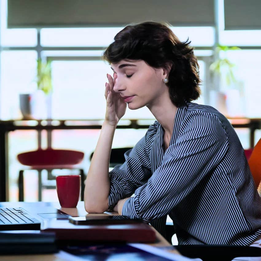 gen z woman stressed focusing on detaching from work as a novel concept