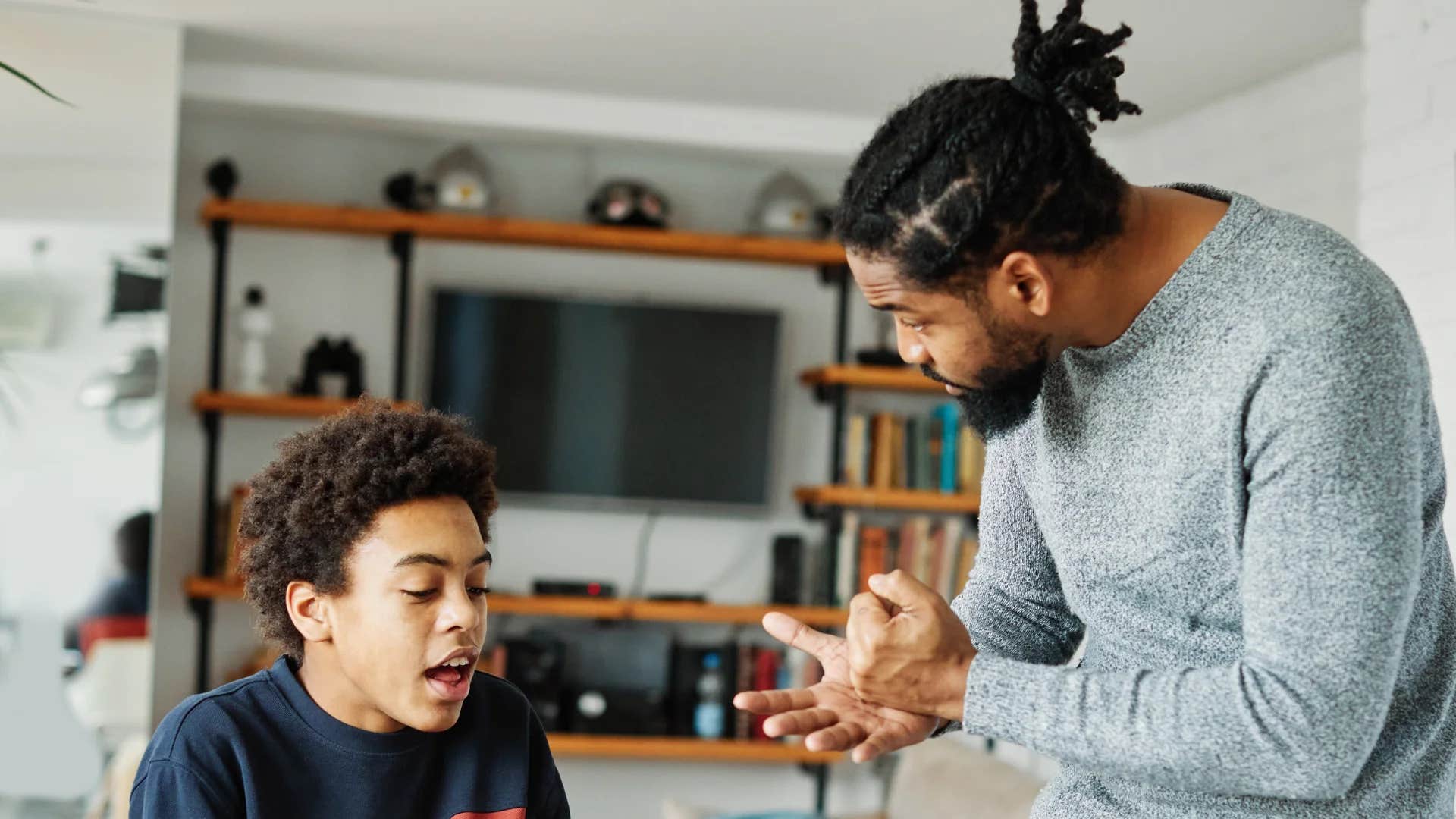 parent telling teenager let's take a beat