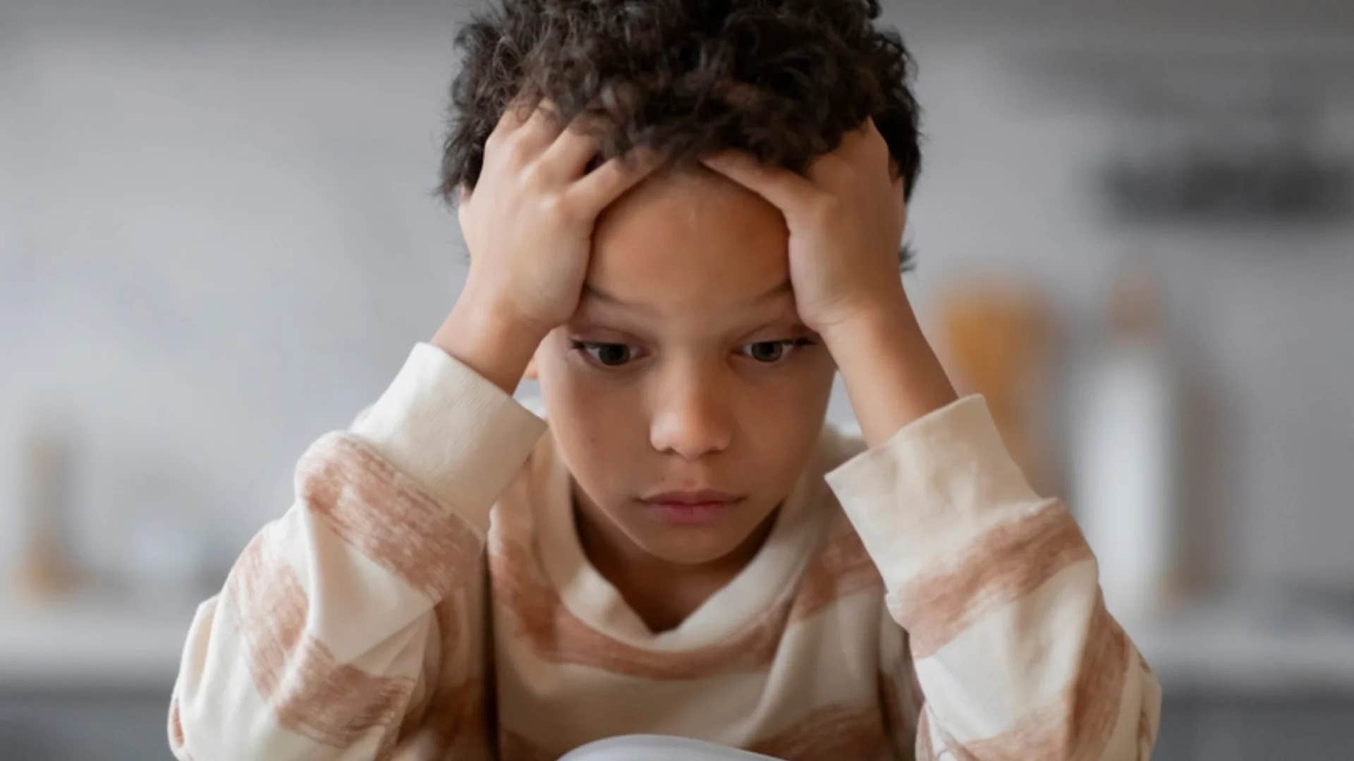 overwhelmed child with too many responsibilities