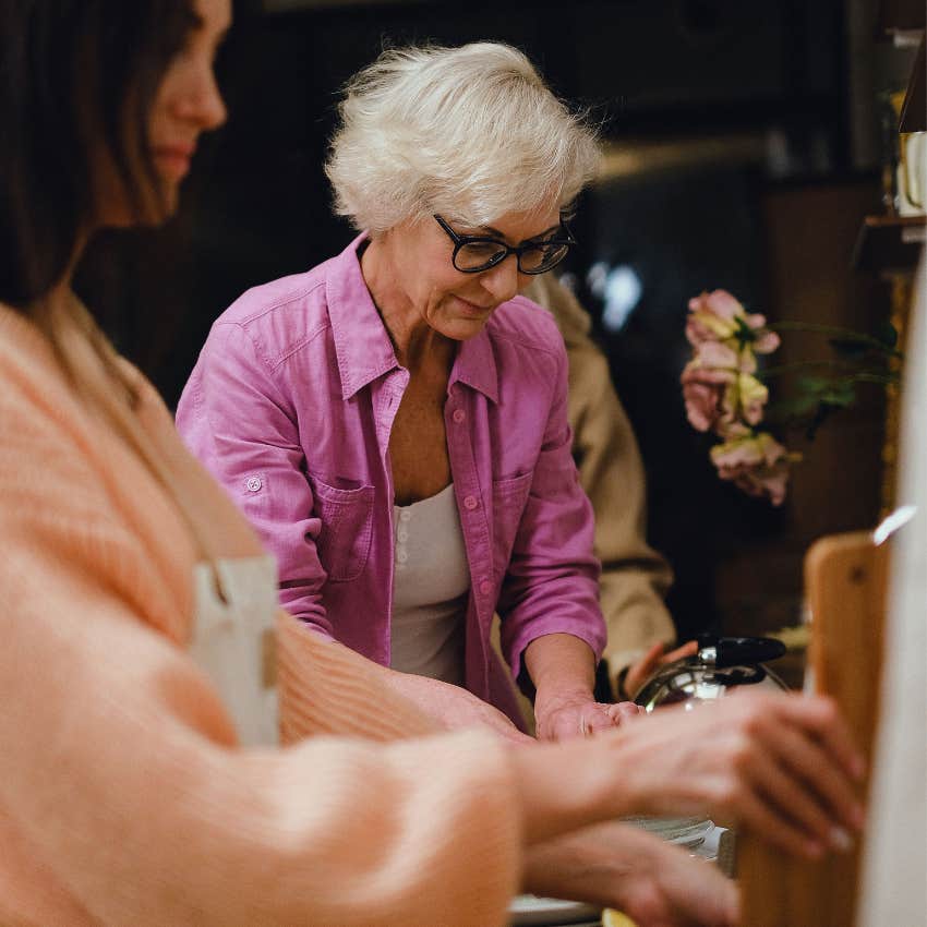 Adult child helping a parent with zero boundaries do everyday tasks while appearing overly responsible for their parent's needs