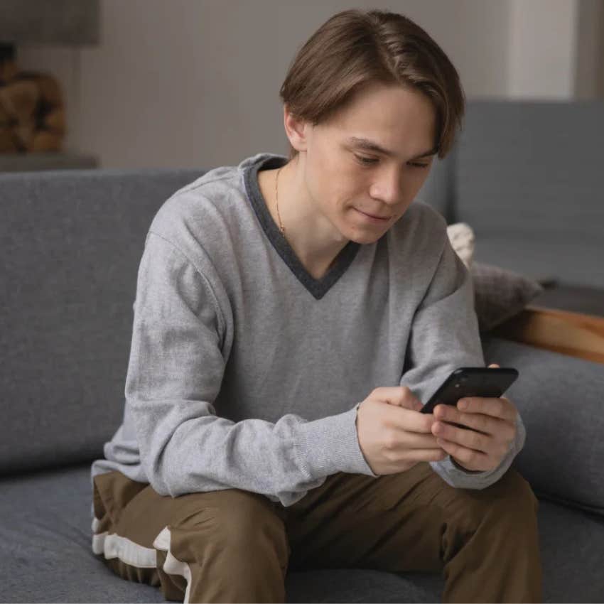 Gen Z man texting someone instead of calling