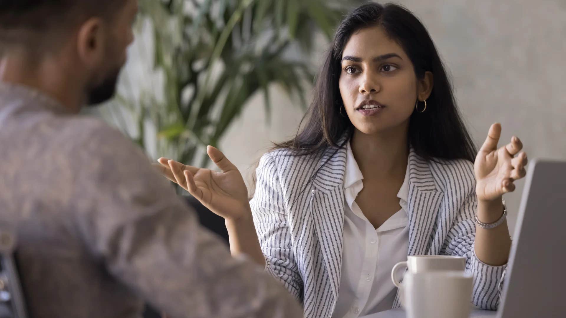 woman answering question what do you mean by that