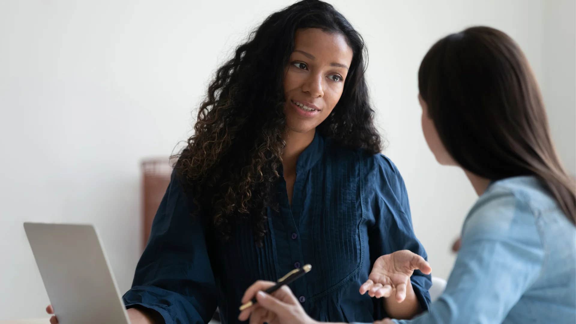 woman asking friend to help her better understand her concerns