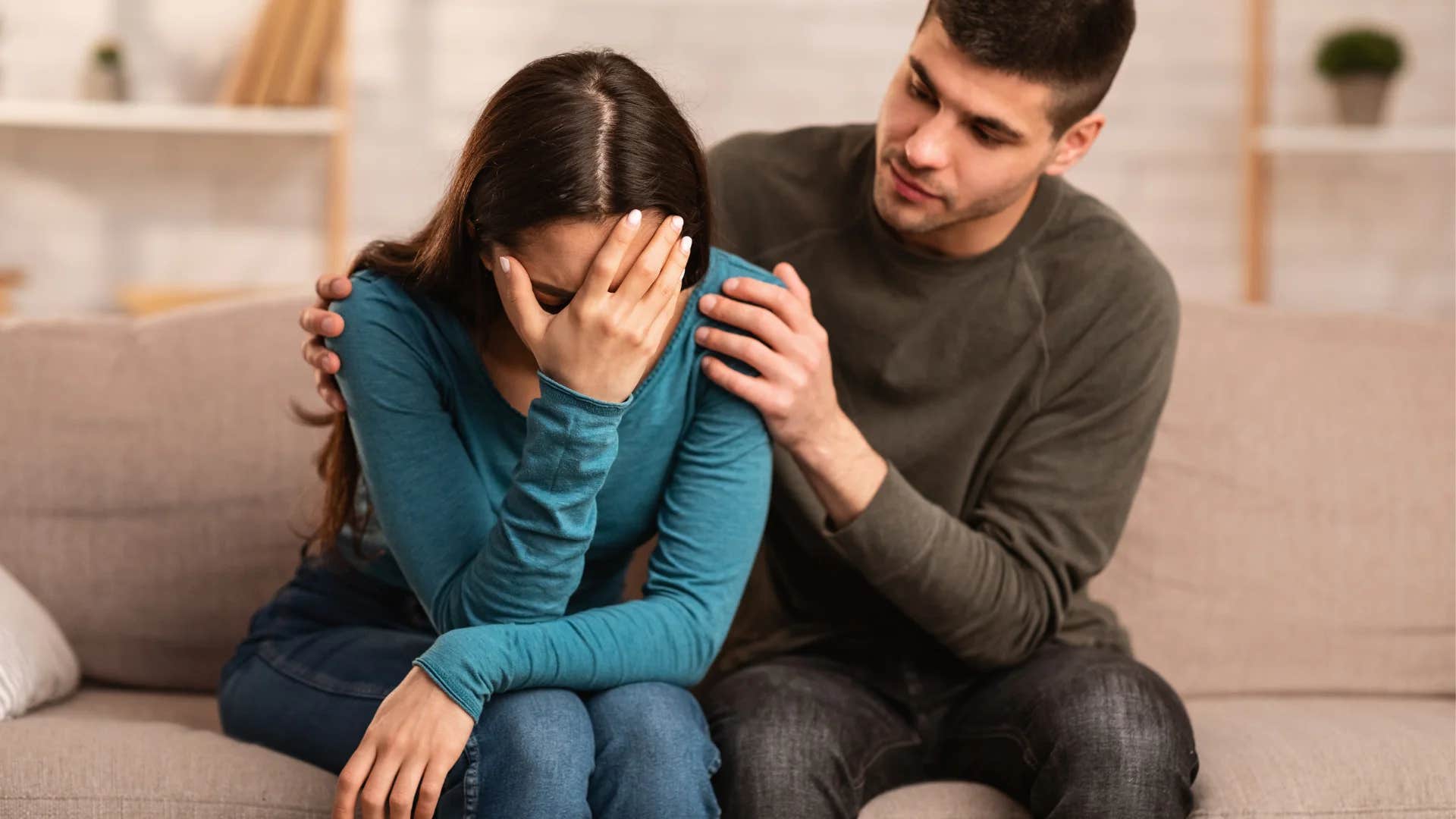 man asking woman what he can do to make something right
