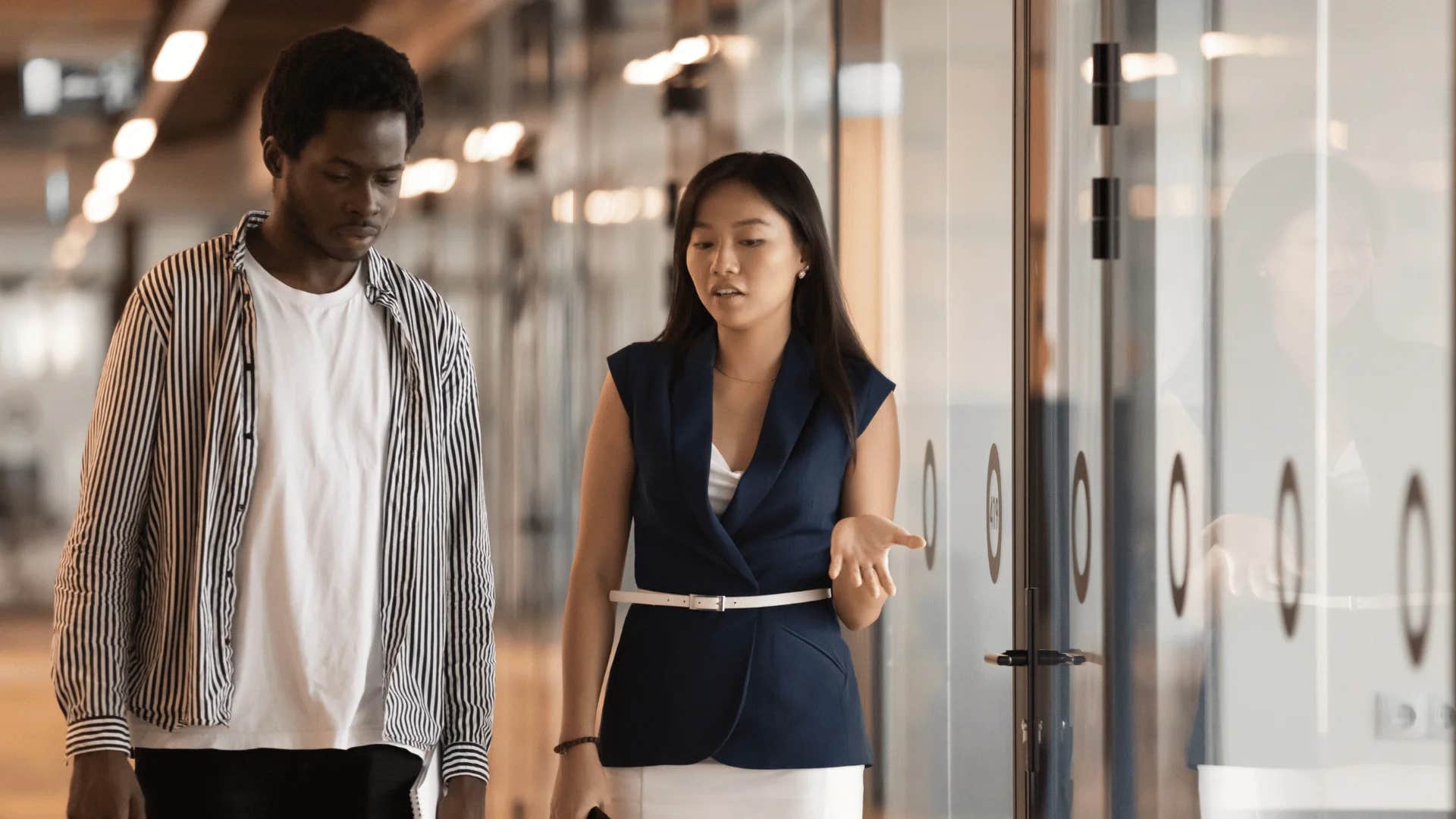 woman telling man our key constraint is resource allocation