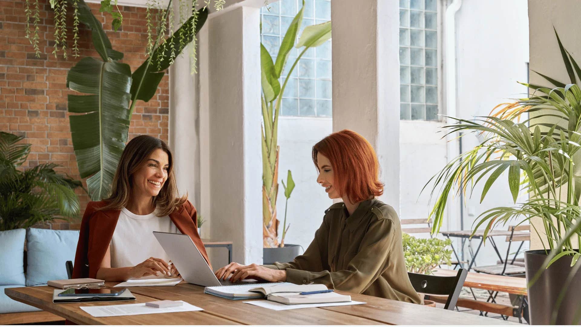 woman working with colleague agreeing they need future-proofed solutions
