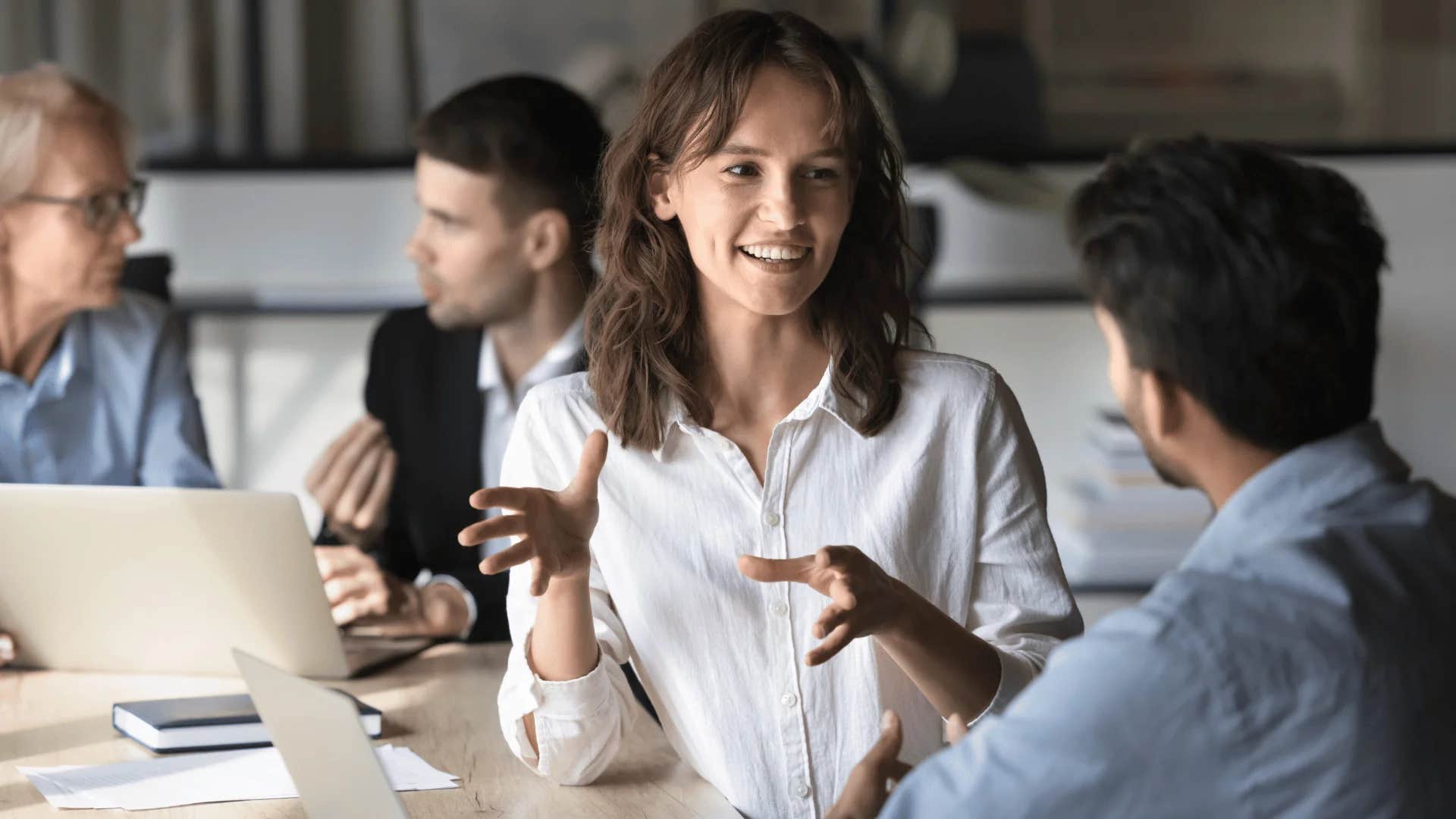 woman telling colleague that they should focus on optimizing efficiency while maintaining agility