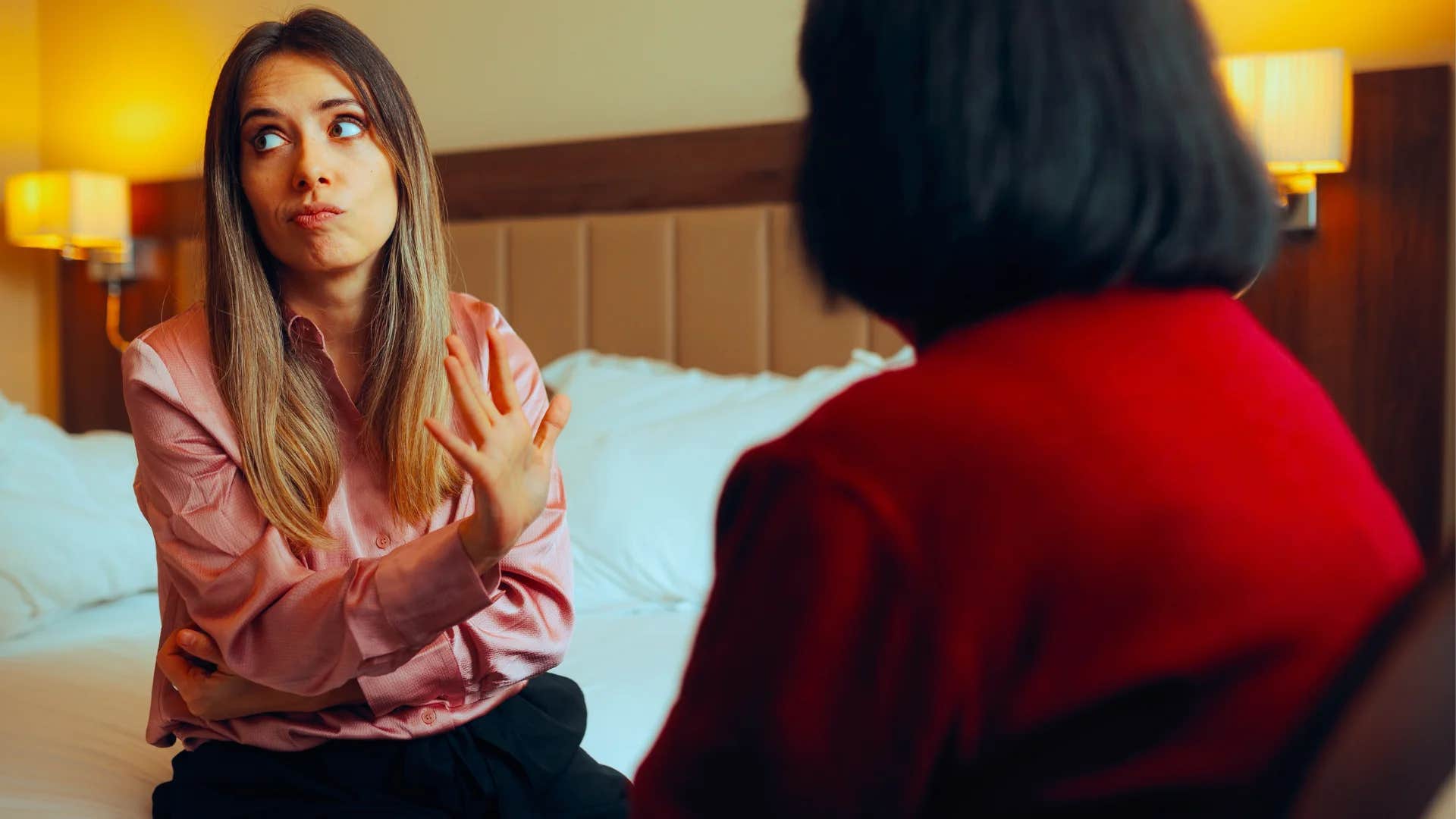 woman telling friend we're pushing the envelope