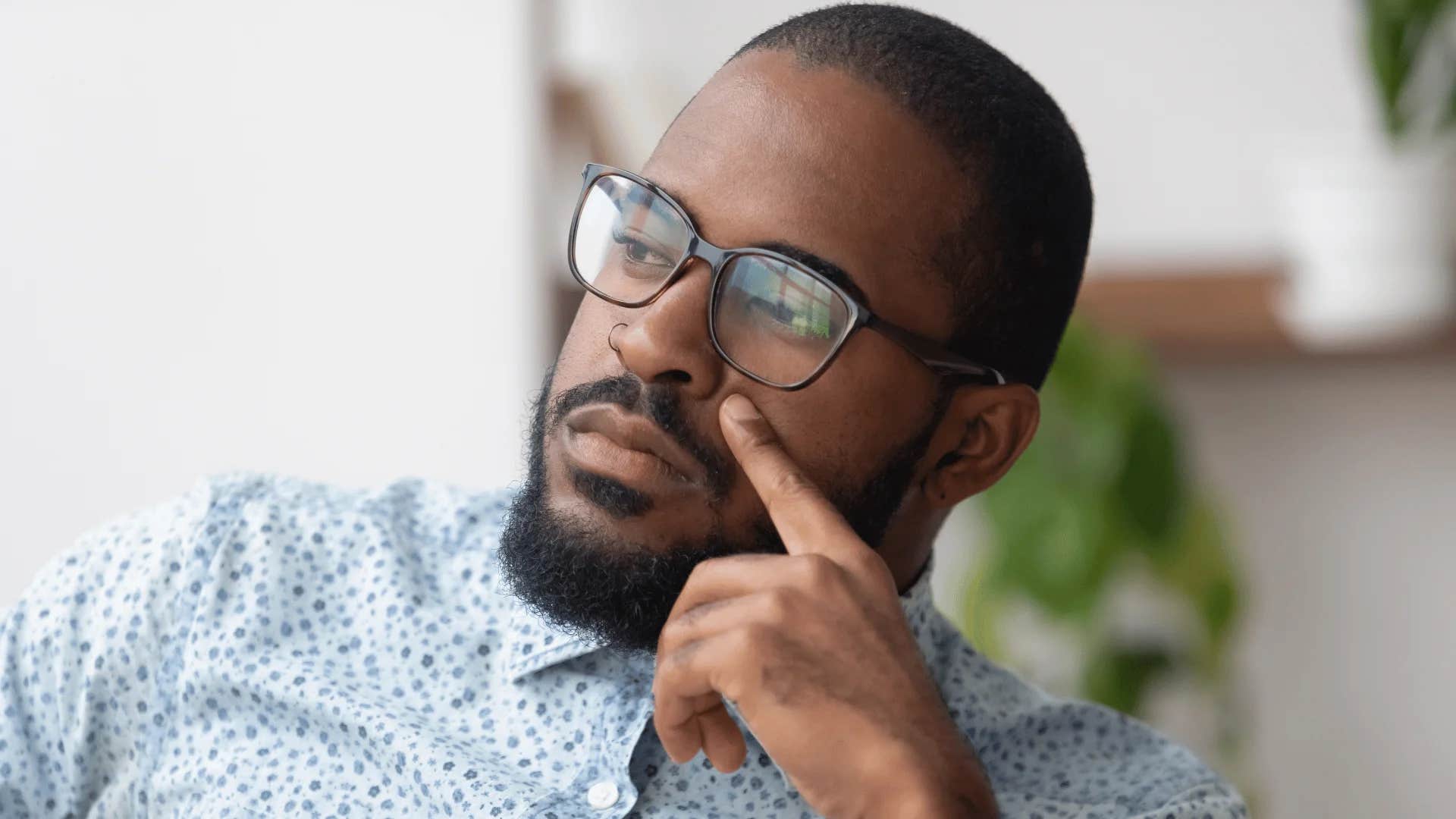 thoughtful man saying let me think about it