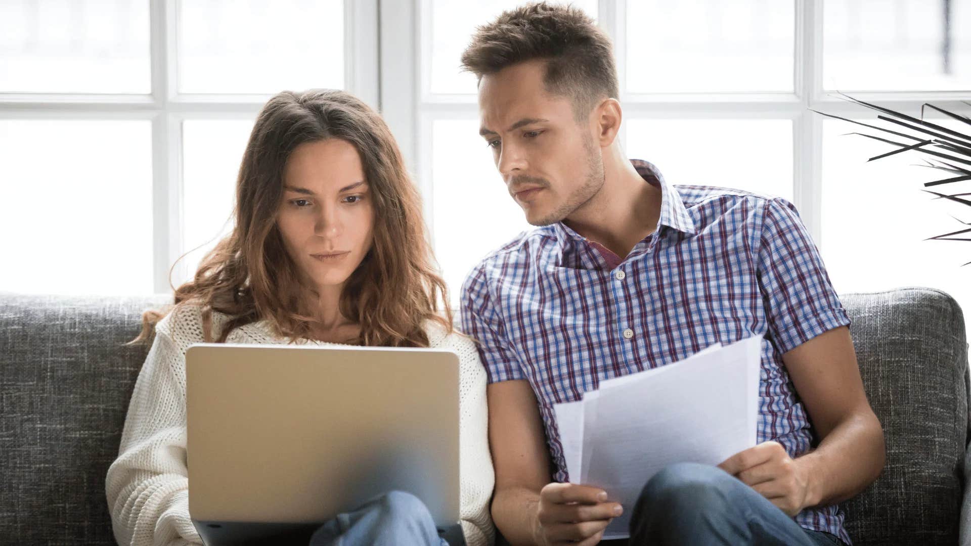woman suggesting to man let's double check to make sure