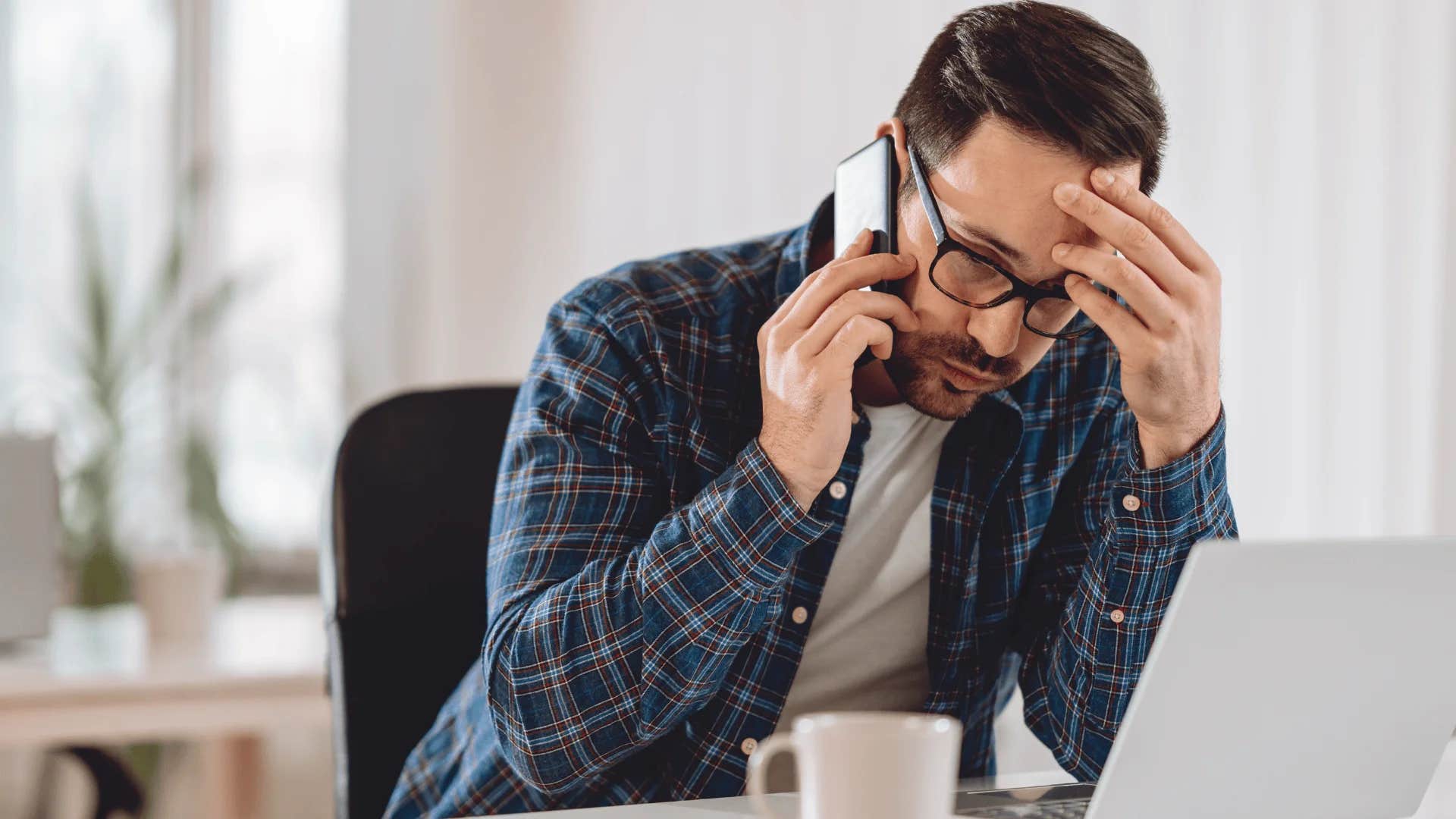 man on phone admitting i made a mistake