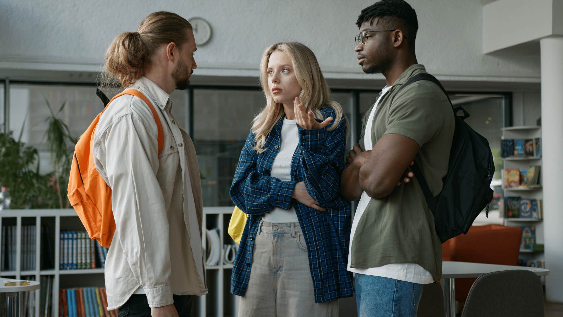 woman snapping at men admitting her feelings are hurt