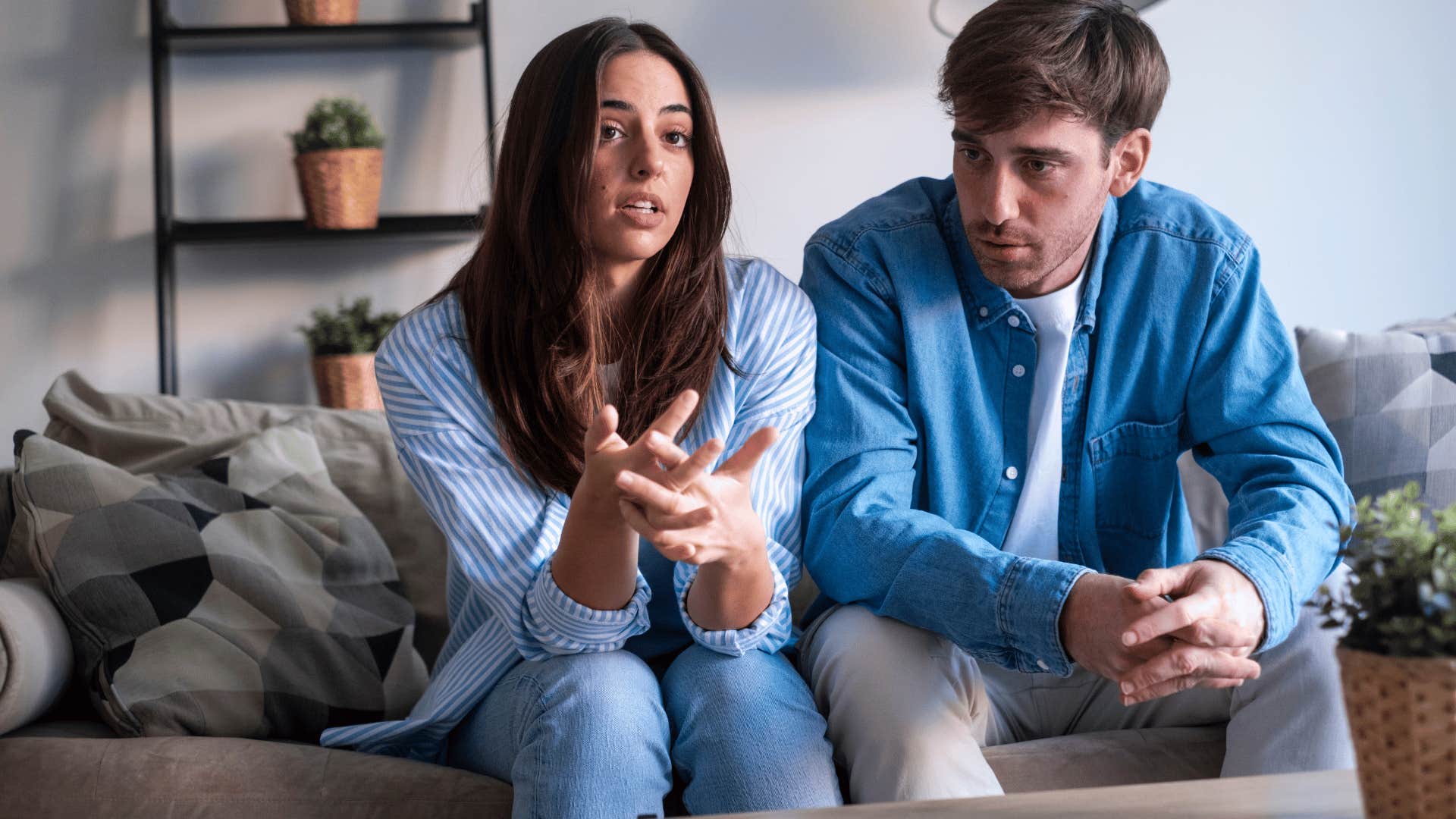 couple arguing woman telling partner this isn't working for me anymore