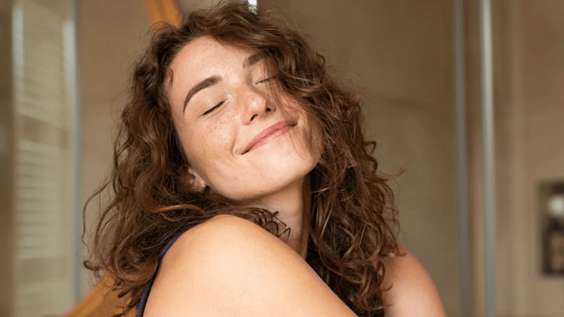 young woman telling herself you're safe now