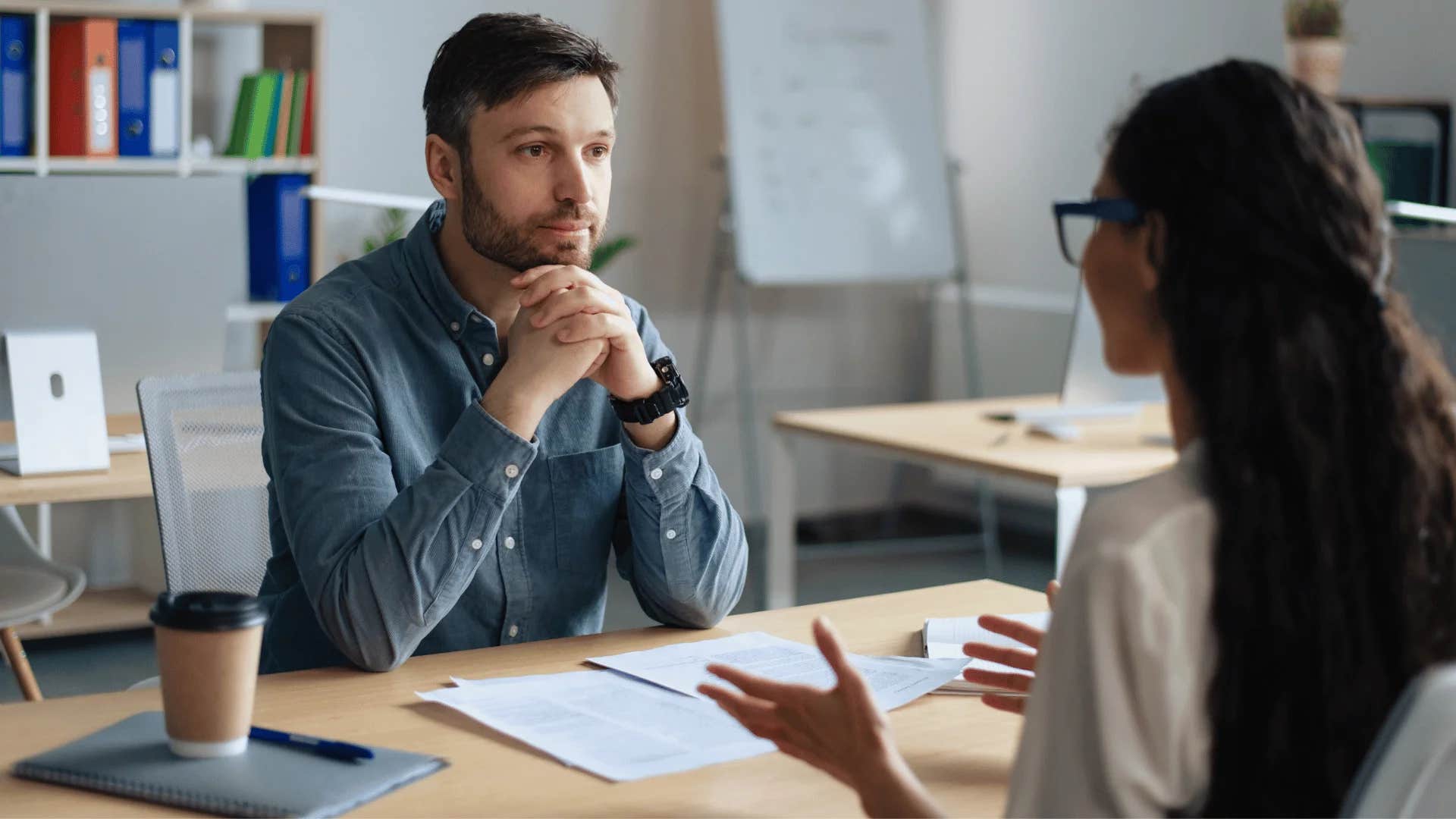 man being told by woman thanks for thinking of me but i have existing commitments