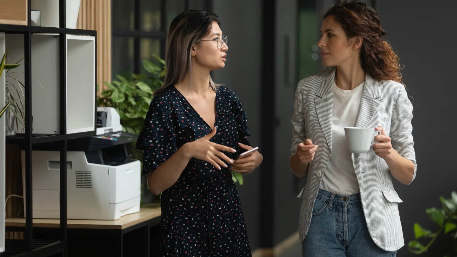 woman telling colleague let's focus on solutions instead of baseless rumors