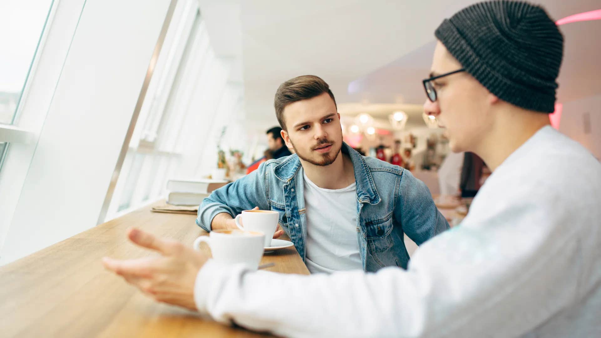 man telling friend that's a reach and not even a good one