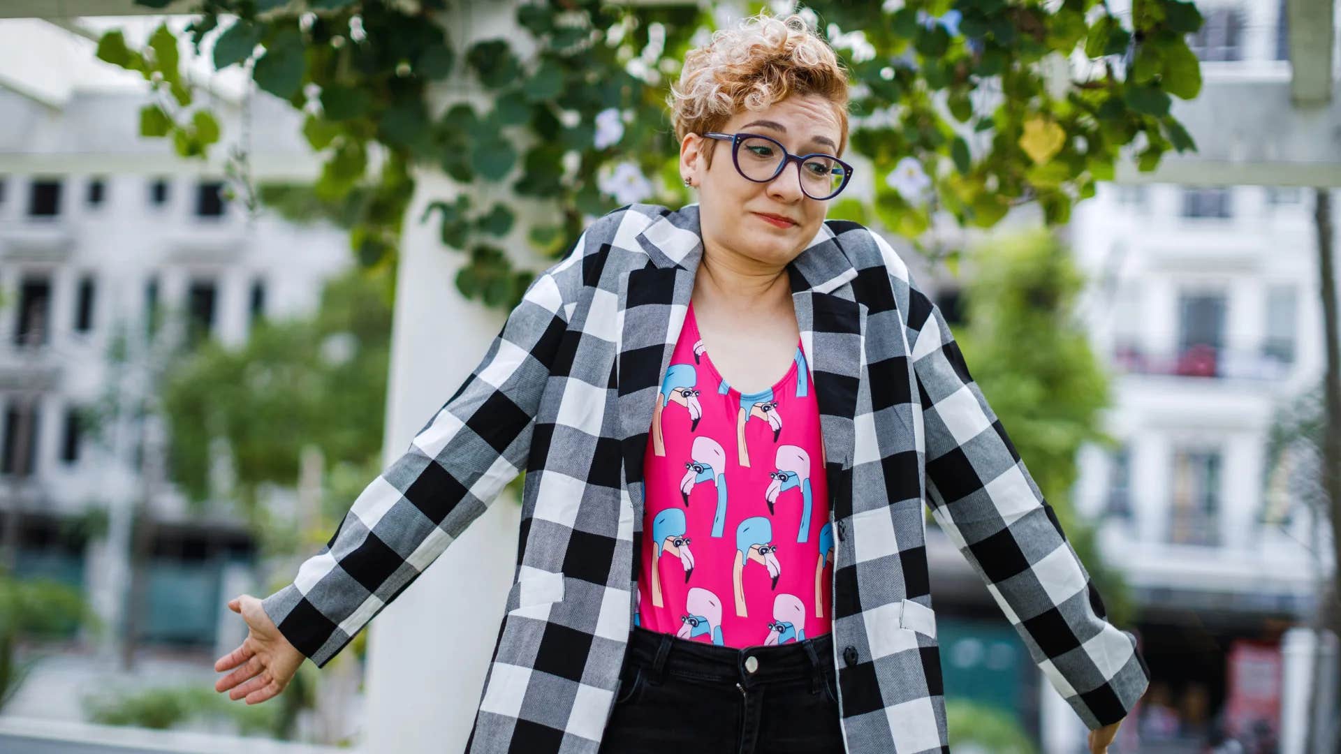 woman with low emotional maturity shrugging saying i'm not like other people