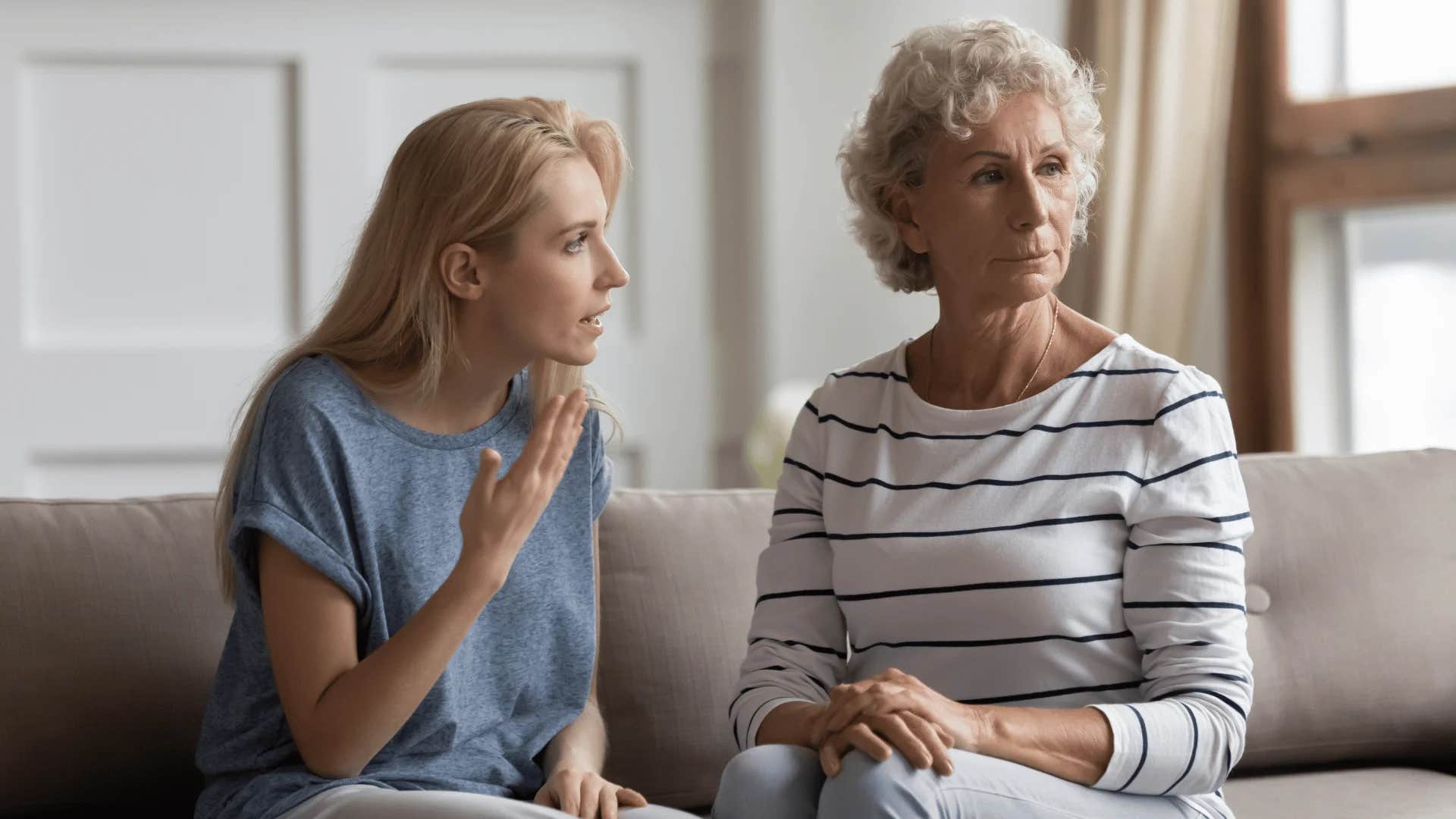 woman telling older woman i told you so