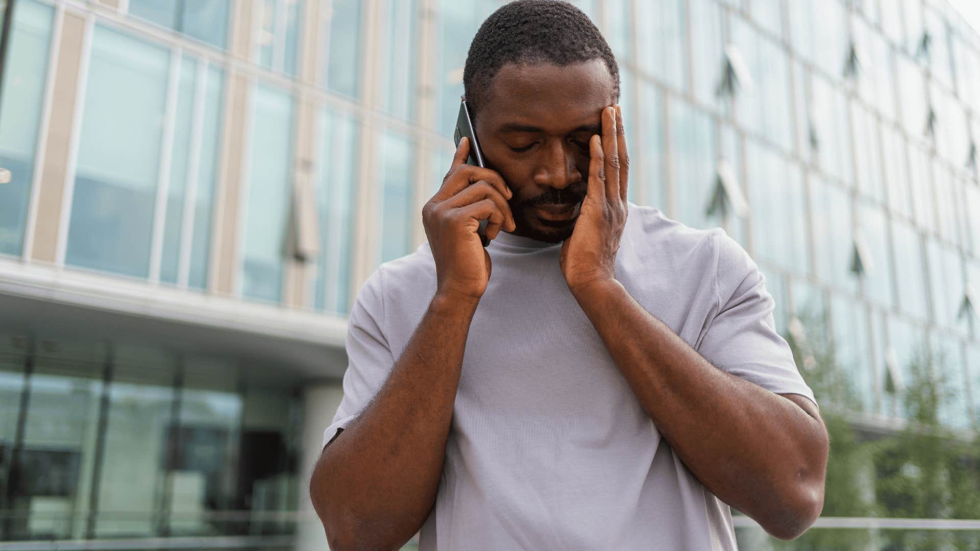 man in gray shirt on the phone upset as he says i had no choice