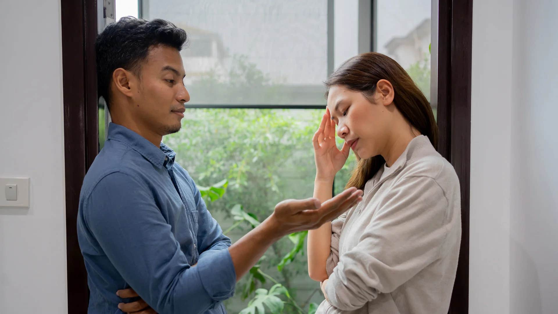 woman cringing at man saying i'm too smart for that