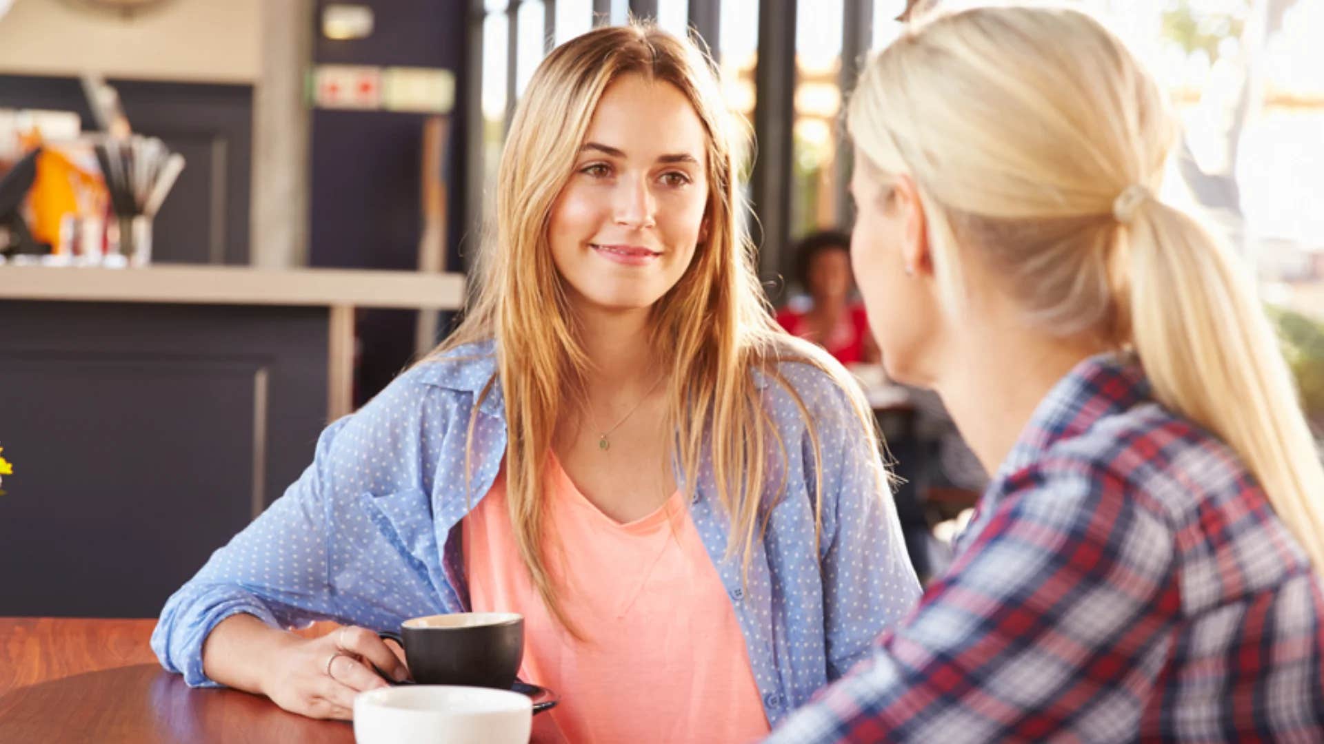 woman asking friend can we pause the conversation