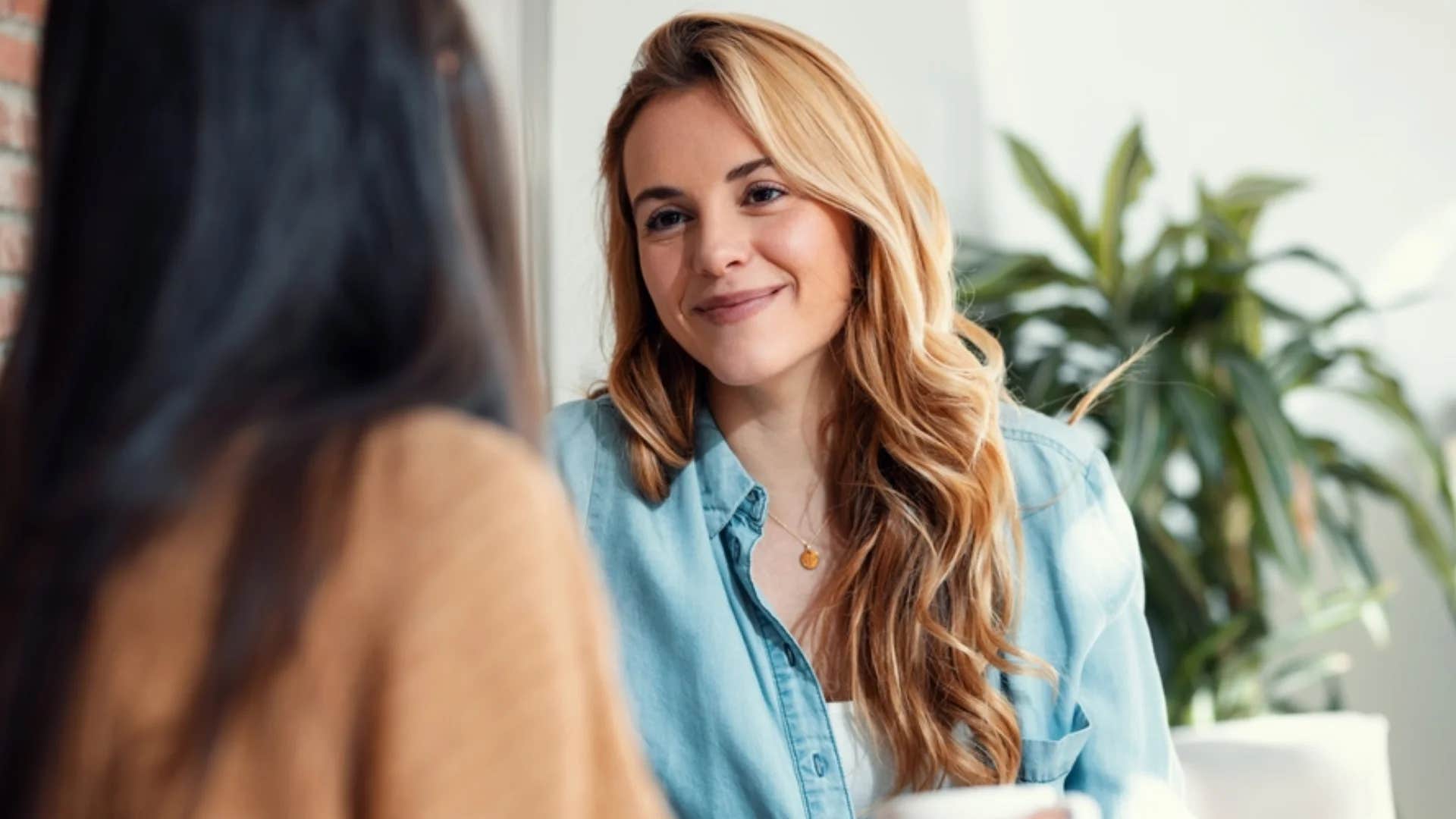woman being interrupted while speaking