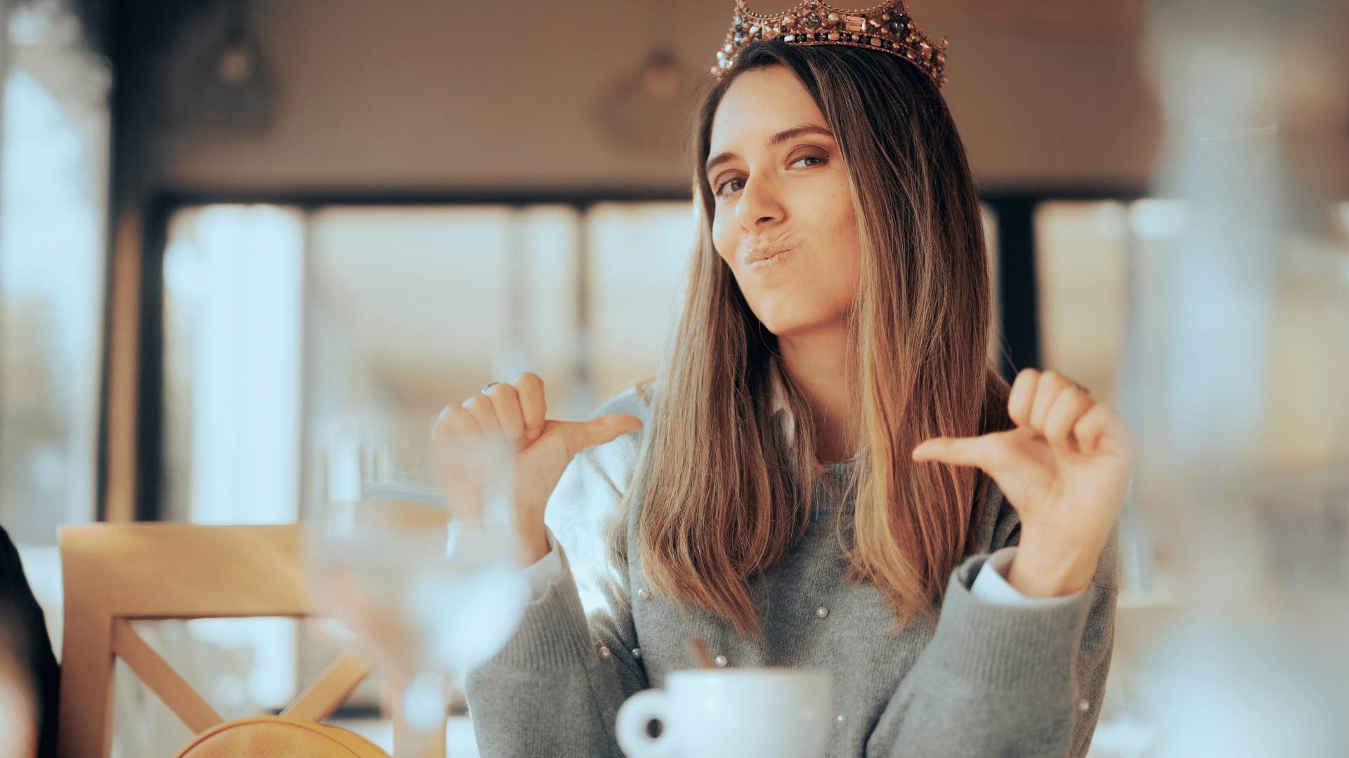 woman pointing at herself as she says i'm kind of a big deal