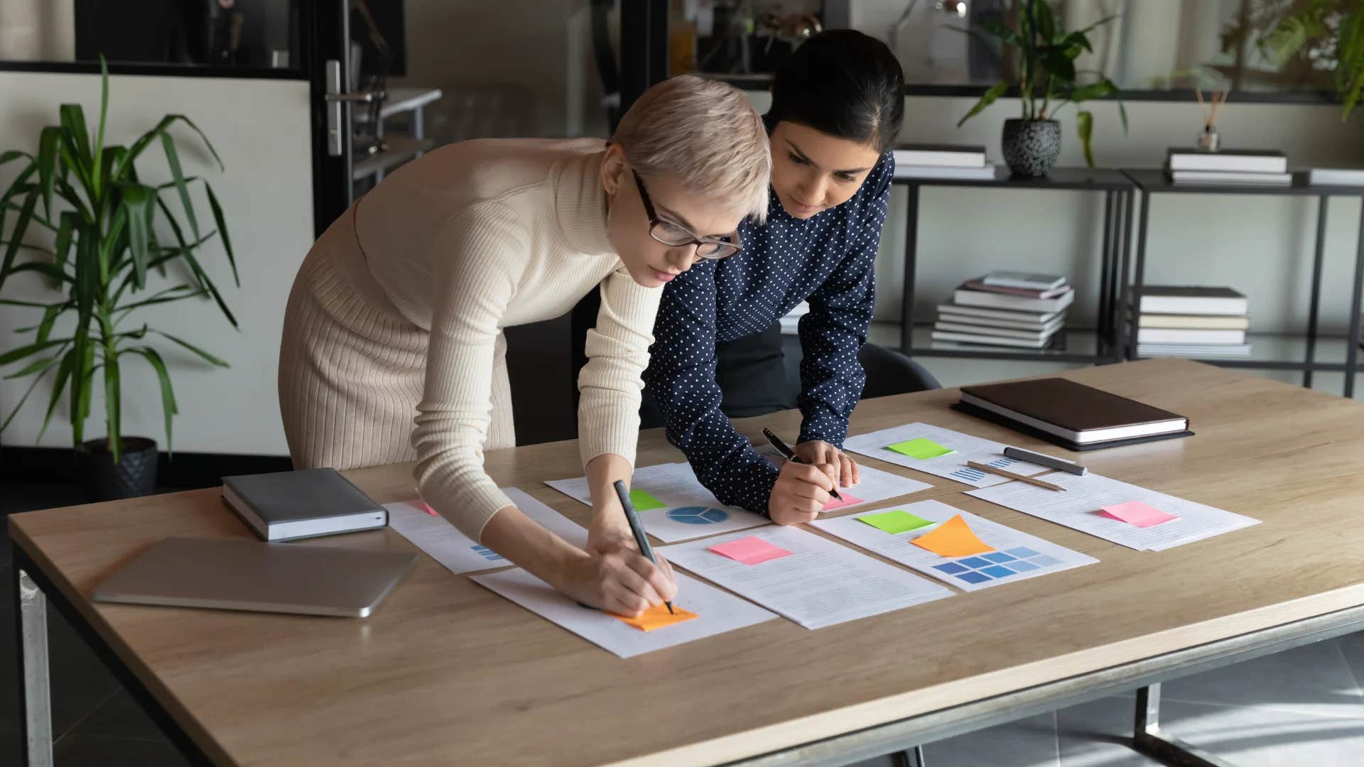 woman asking colleague what proves this is true