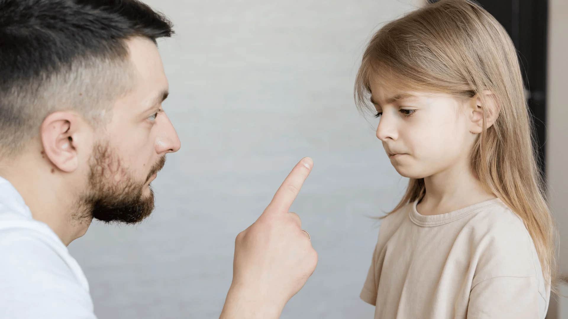 man telling young girl it's like i'm talking to a brick wall with you