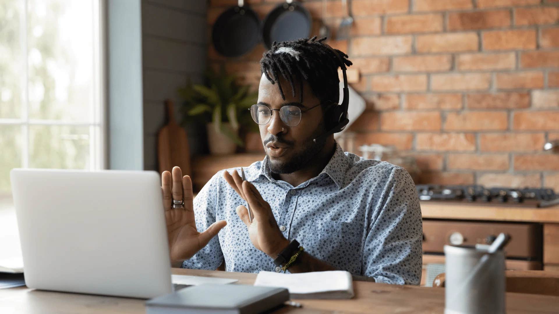 man telling colleague to speak when spoken to but don't interrupt